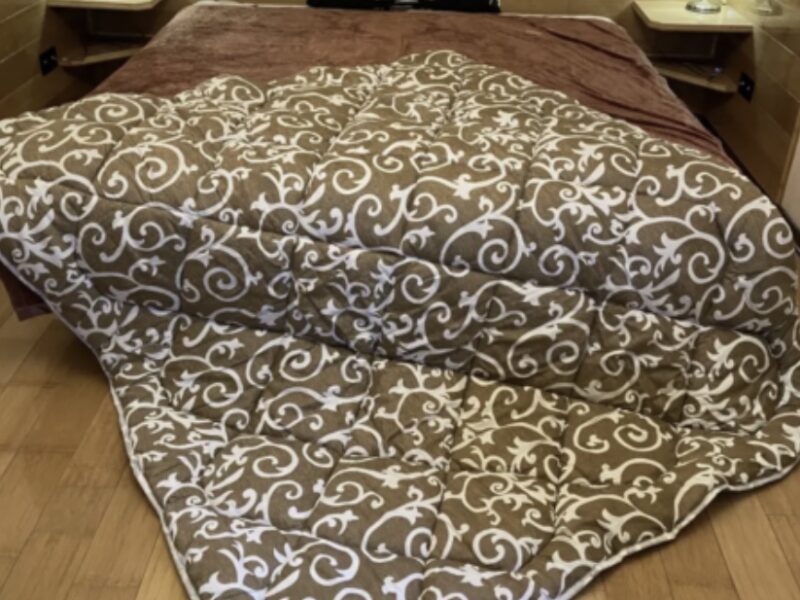 Тепла зимова ковдра на овчині