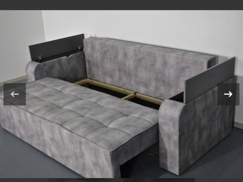 Диван Бухарест розкладний є ніша в підлокітниках та велике спальне місце